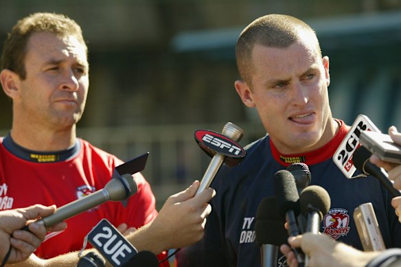 Ricky Stuart and Chris Walker face the media in 2003.