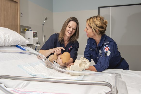 Paramedic Anna Esposito and midwife Kerry Tosswill in the birthing unit at Nepean Hospital. 