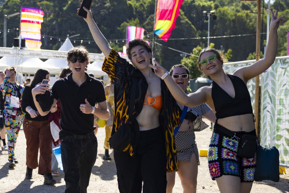 Festival goers enter the gates on Friday.