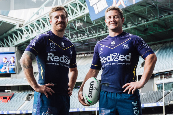 Cameron Munster (left) and Harry Grant launch Melbourne’s return to Marvel Stadium in July.