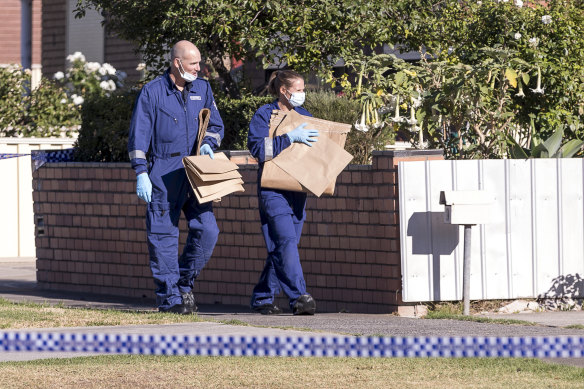 Police at the scene of the murder in March 2018.