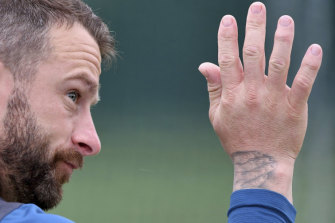 Putting his hand up: Matthew Wade in the nets at Edgbaston.