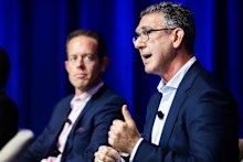 Suncorp CIO Adam Bennett, right, at the AI Summit on Tuesday. 
