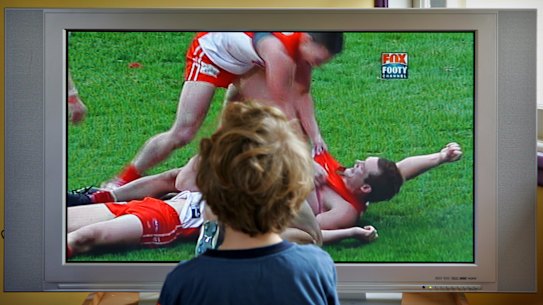 AFL footy on the box.