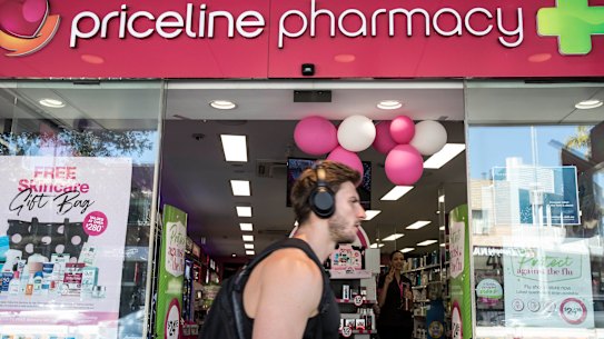API, which owns Priceline pharmacies, watches while its suitors slug it out.