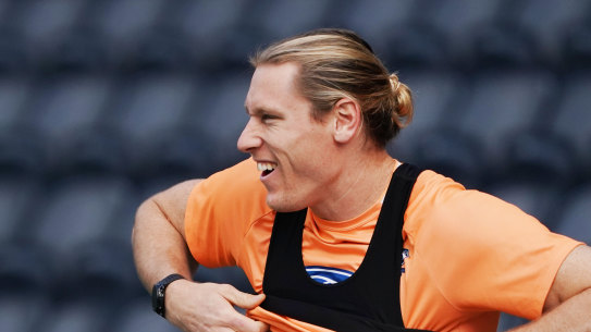 Mark Blicavs puts on a heart-rate monitor at training this week.