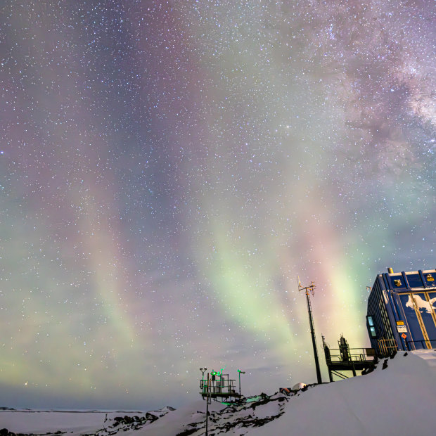 “A thin covering of cloud turned the ordinarily electric-green and red aurora into a spread of pastels above the Bureau of Meteorology building,” says photographer and Antarctic station carpenter Jared McGhie.