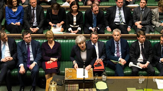 Prime Minister Theresa May speaks to lawmakers in the House of Commons.