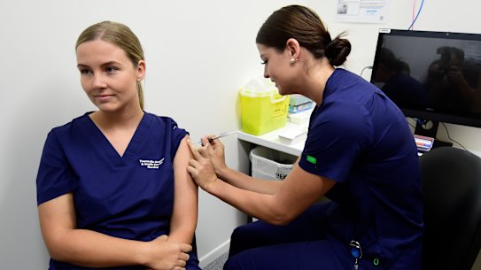 Registered nurse Rebecca DeJong received a COVID-19 vaccination at Townsville University Hospital last month.