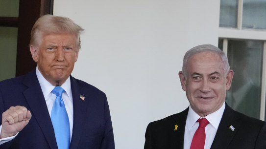 Trump greets Netanyahu as he arrives at the White House.