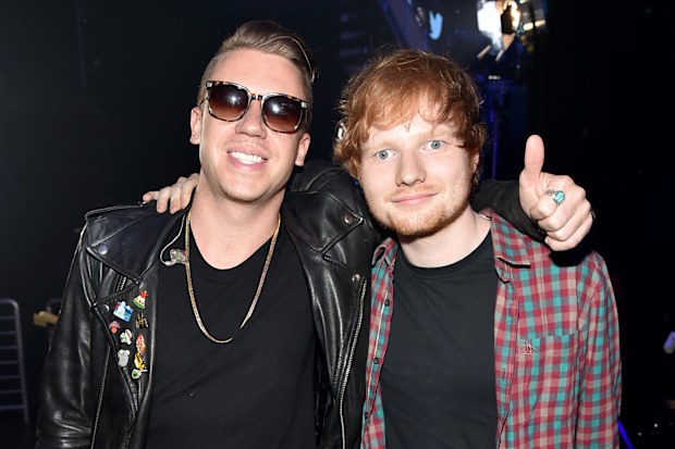 LAS VEGAS, NV - SEPTEMBER 20: Recording artists Macklemore (L) and Ed Sheeran attend the 2014 iHeartRadio Music Festival at the MGM Grand Garden Arena on September 20, 2014 in Las Vegas, Nevada. (Photo by Theo Wargo/Getty Images for iHeartMedia)