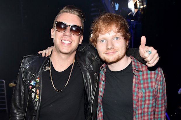 LAS VEGAS, NV - SEPTEMBER 20: Recording artists Macklemore (L) and Ed Sheeran attend the 2014 iHeartRadio Music Festival at the MGM Grand Garden Arena on September 20, 2014 in Las Vegas, Nevada. (Photo by Theo Wargo/Getty Images for iHeartMedia)