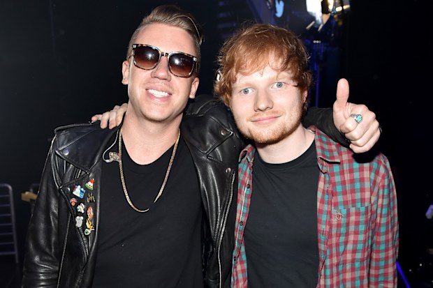 LAS VEGAS, NV - SEPTEMBER 20: Recording artists Macklemore (L) and Ed Sheeran attend the 2014 iHeartRadio Music Festival at the MGM Grand Garden Arena on September 20, 2014 in Las Vegas, Nevada. (Photo by Theo Wargo/Getty Images for iHeartMedia)