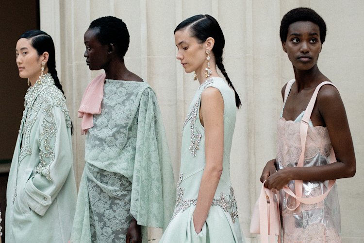 Models backstage at Erdem at London Fashion Week, 2024.
