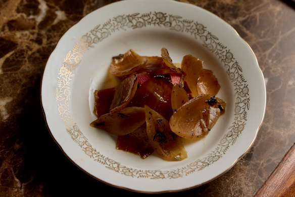 Onions with fried sweetbreads and bone marrow.