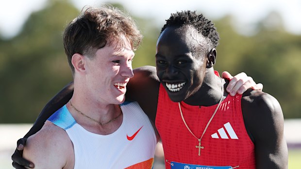 Rivals and friends: Lachie Kennedy and Gout Gout embrace.