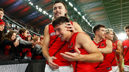 Sam Draper congratulates Massimo D’Ambrosio after the Bombers’ round 14 win against St Kilda.