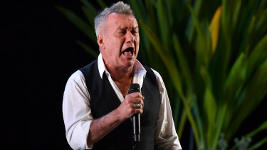 Jimmy Barnes performs Working Class Man during the state memorial service for Clean Up Australia co-founder Ian Kiernan at the Sydney Opera House in Sydney on Friday.