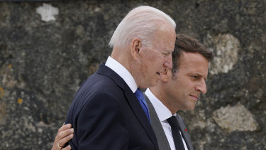 Joe Biden and Emmanuel Macron pictured at the G7 summit in June during happier times in the US-French relationship.  
