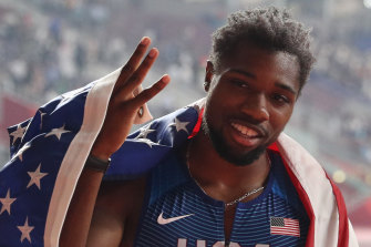 American Noah Lyles celebrates his first world title, in the 200 metres.