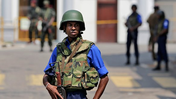 Sri Lankan navy soldiers keep guard outside St Anthony's Church in Colombo on Thursday after more suspicious items were found. 