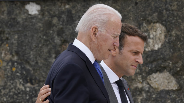 Joe Biden and Emmanuel Macron pictured at the G7 summit in June during happier times in the US-French relationship.  