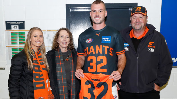 Kieren Briggs receives his GWS jersey before his club debut last month.