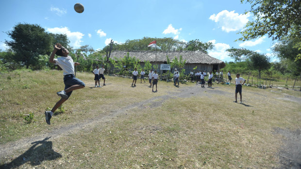 Students play outside at a school in Kupang, West Timor.