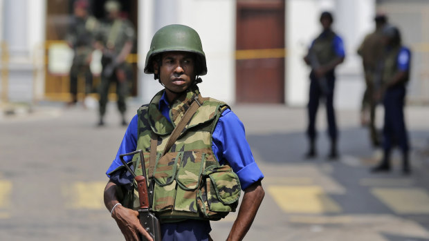 Sri Lankan navy soldiers keep guard outside St Anthony's Church in Colombo on Thursday after more suspicious items were found. 