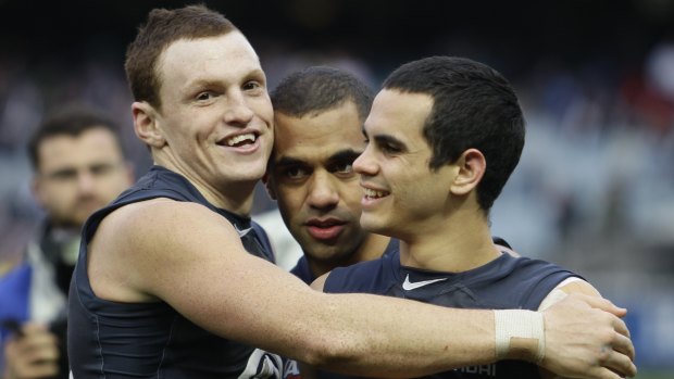 A youthful Mitch Robinson with Carlton teammates in 2011.