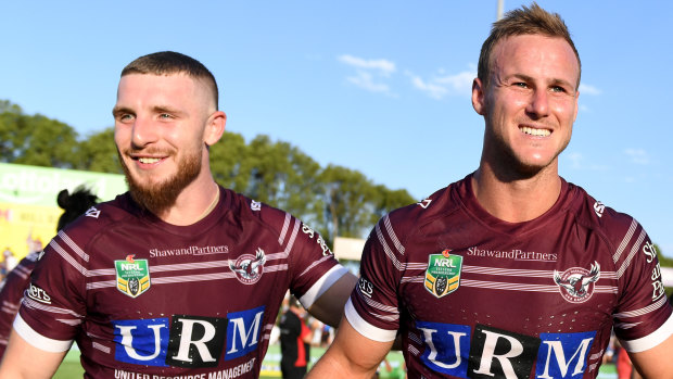 Happier times: Hastings and Cherry-Evans celebrate at Brookvale.