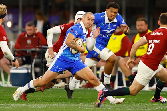 Dylan Pietsch of the Force looks to avoid being tackled.