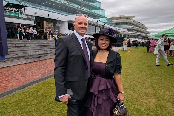 Darren Anquetil and Suryani Suerz dressed in purple today, contrary to the traditional black and white attire on Derby Day. 
