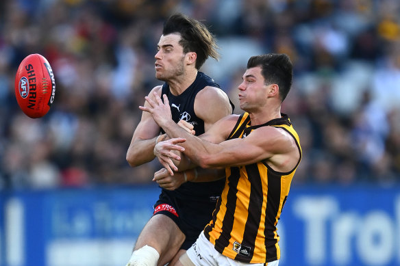 Lachie Plowman, left, and Jaeger O’Meara collide during round 10. 