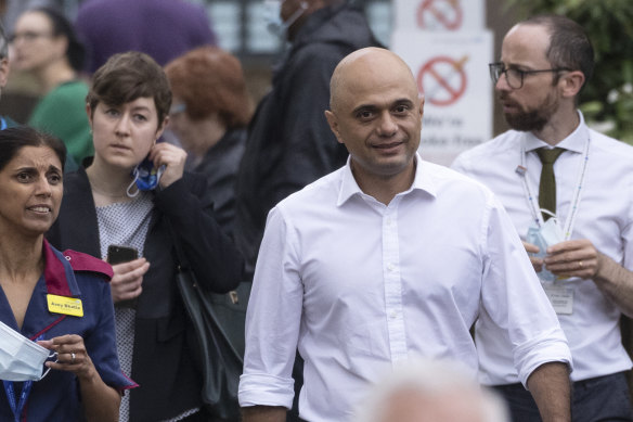 Health secretary Sajid Javid (centre) has tested positive to COVID-19 despite receiving two vaccine doses. 