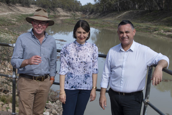Premier Gladys Berejiklian flanked by Deputy Premier John Barilaro on her left and Adam Marshall, the Agriculture Minister, on her right.
