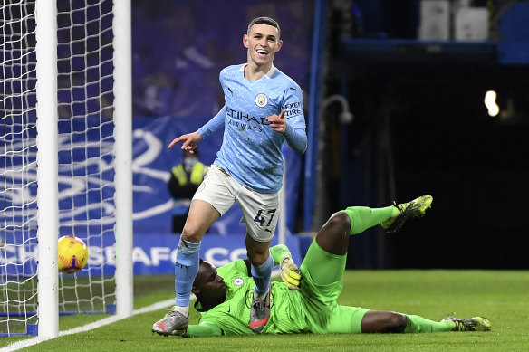 Phil Foden celebrates after scoring City's second against Chelsea.