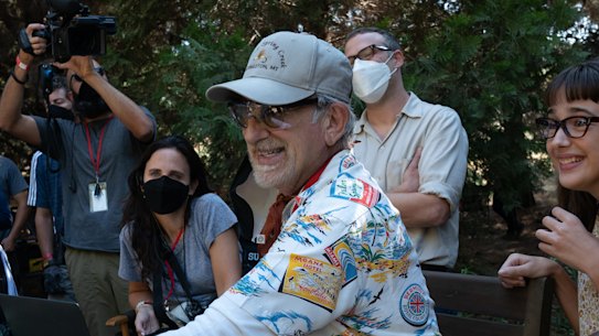 Steven Spielberg on the set of The Fabelmans with, from left, producer Kristie Macosko Krieger, actors Seth Rogen and Julia Butters, co-writer and producer Tony Kushner, and actors Keeley Karsten and Sophia Kopera.