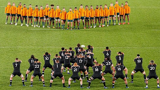Australian players watch as the All Blacks perform a haka ahead of the Bledisloe Cup rugby test match between the All Blacks and the Wallabies at Eden Park in Auckland, New Zealand, Saturday, Sept. 24, 2022. (David Rowland/Photosport via AP)