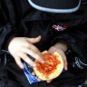 A pie with sauce at the footy, 2002.
