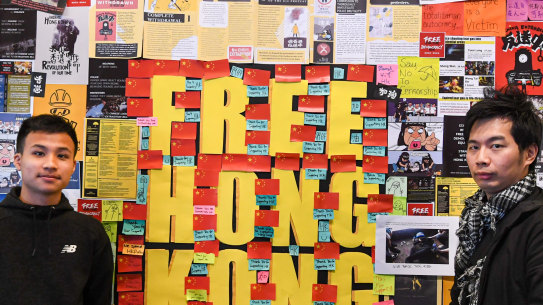 A poster wall covered in messages supporting democracy in Hong Kong at the University of Technology, Sydney