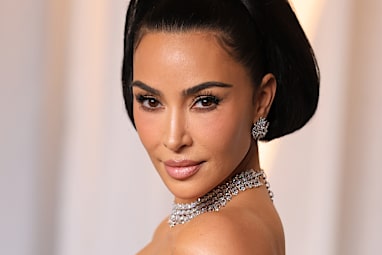 Kim Kardashian reportedly blindsided her mum by including details of her alleged affair in a book.