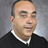 This undated photo provided by Kentucky Court of Justice shows slain District Judge Kevin Mullins who was killed in his chambers by a sheriff.