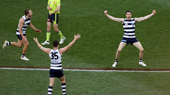 Jeremy Cameron and the Cats celebrate.