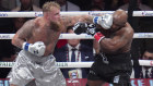 Jake Paul lands a left to Mike Tyson during their heavyweight boxing match which became the most streamed sporting event in history in November.