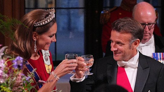 France’s President Emmanuel Macron clinks glasses with Catherine, Princess of Wales, during the state banquet at Windsor Castle on Tuesday,