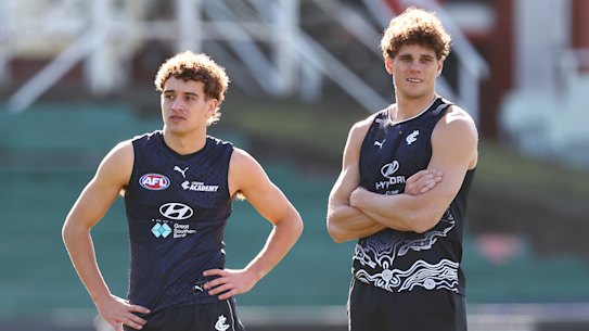Cody Walker, left with ex-Blue Charlie Curnow, is Carlton-bound. Curnow’s trade helped the Blues gain picks they will need to match a bid for Walker. 
