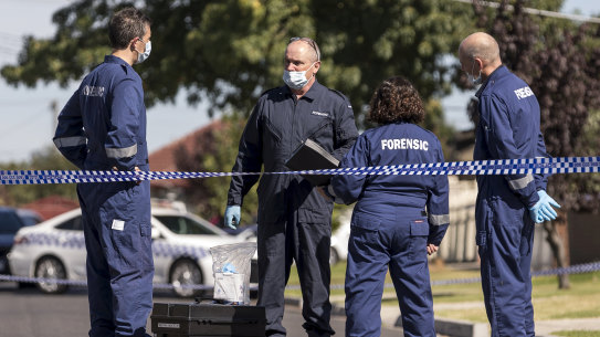 Police near the scene of the 2018 murder.