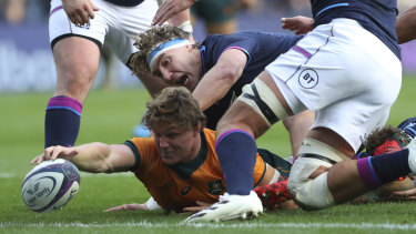 Michael Hooper scored a try but found himself arguing with Romain Poite about a clean out in its build up moments later.