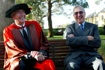 Sir Gerard Brennan with his son Frank - the Jesuit priest, professor of human rights and Indigenous rights campaigner - after Frank received an honorary doctorate of law from UNSW in 2005.